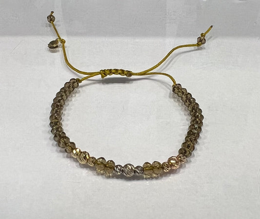Yellowish Green Gemstones Cord Bracelet in 18K Gold